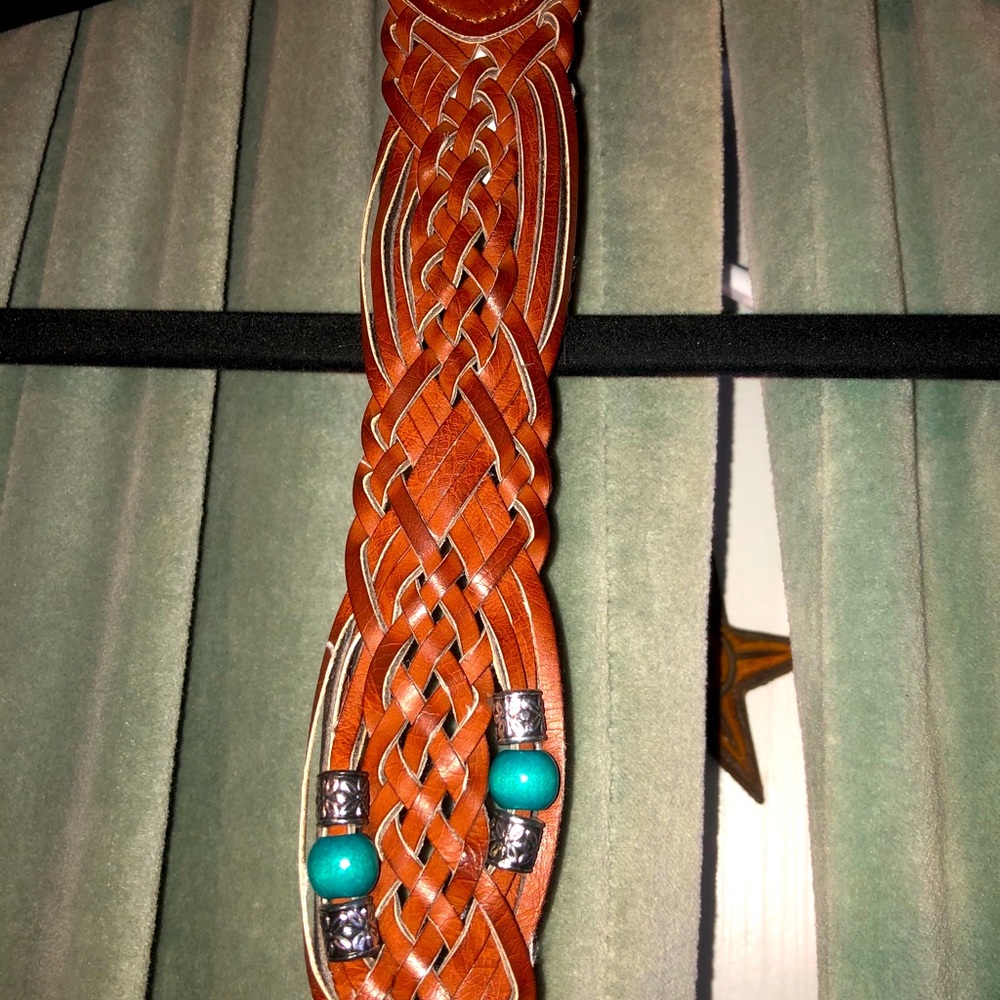 Beaded and woven leather belt.